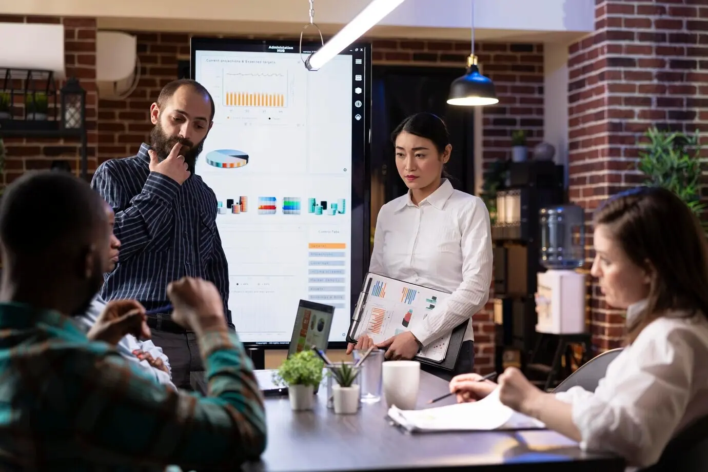 Professionals examining financial trends